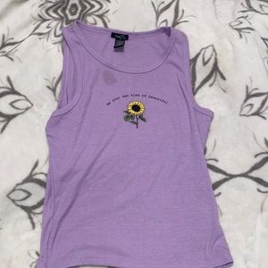 purple tank with little stain (shown)